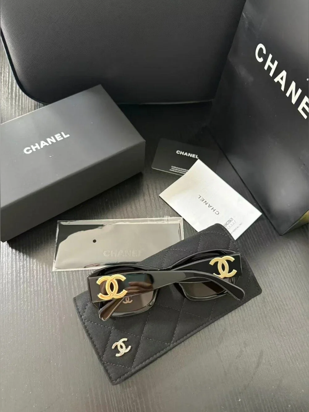 CHANEL Black Frame Sunglasses with Brown Gradient Lenses
